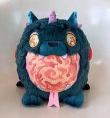 Mini Squishable Hellmouth plush with blue fur, big eyes, horns, and an orange-yellow swirling belly.