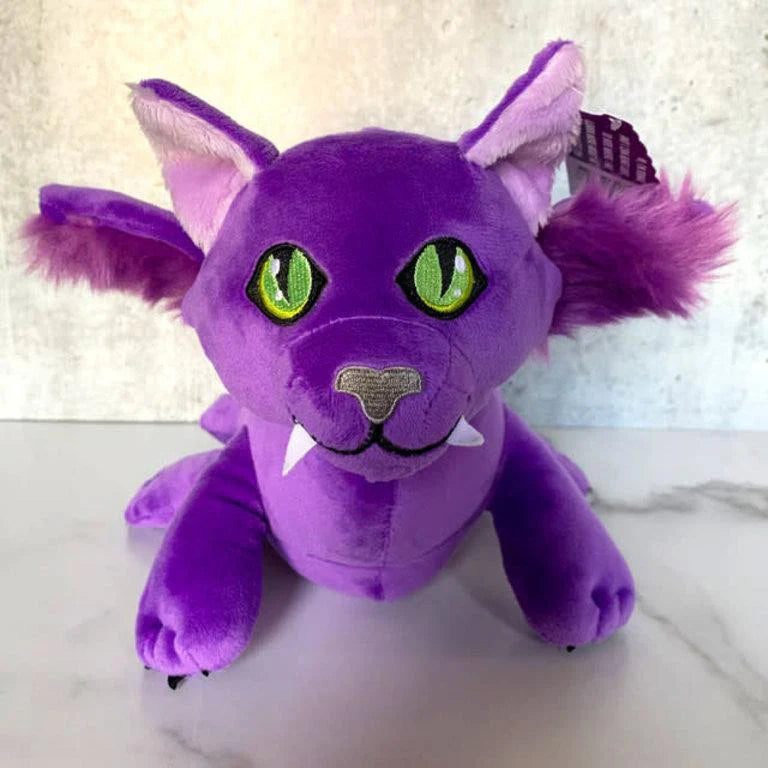 Donna the Phase Cat Plush with green eyes and white fangs.