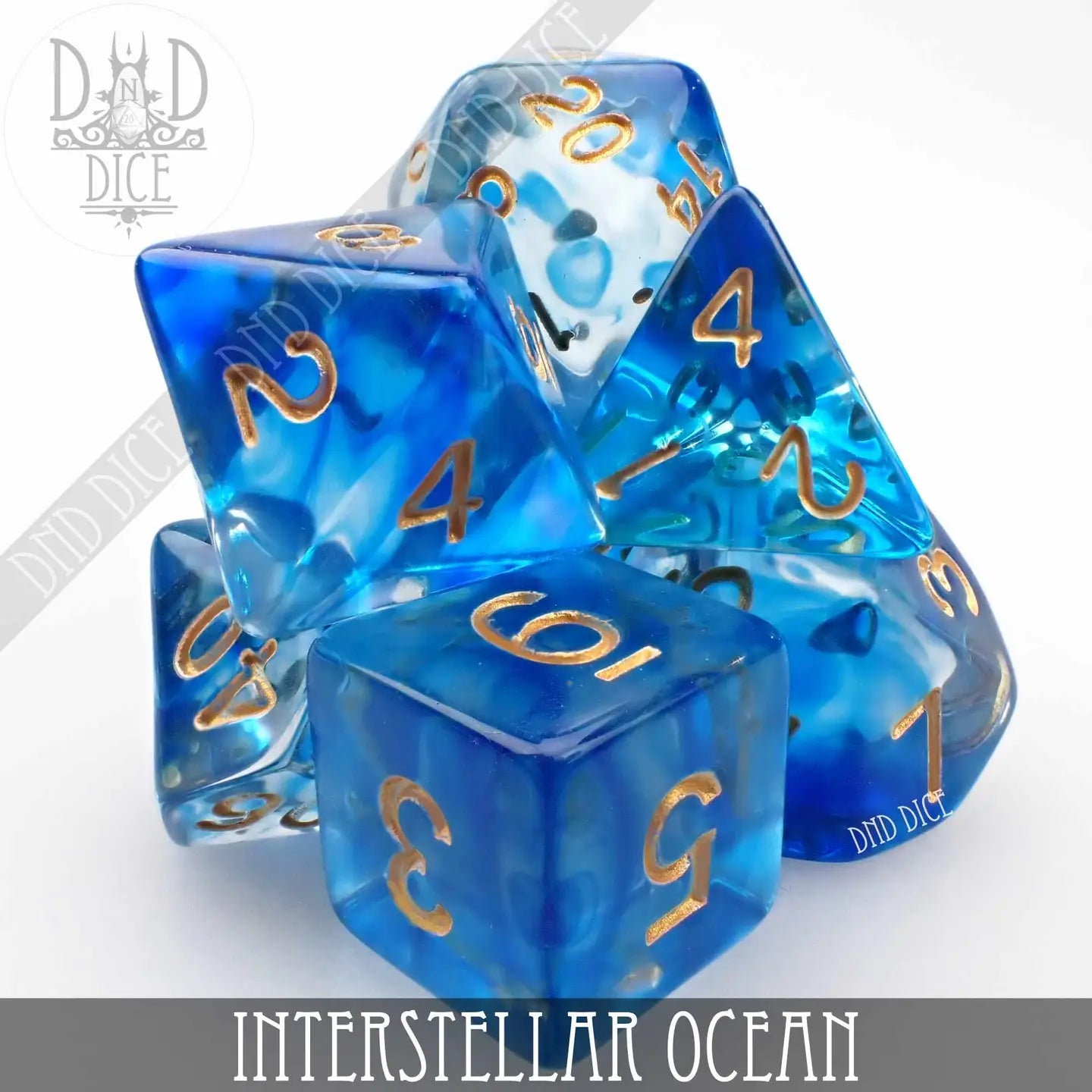 Interstellar Ocean Dice Set with blue dice and gold numbers on a white background.