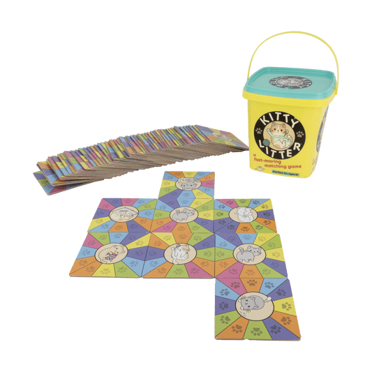 Kitty Litter game tiles featuring kawaii cats, additional tiles, and the yellow Kitty Litter container on a surface.
