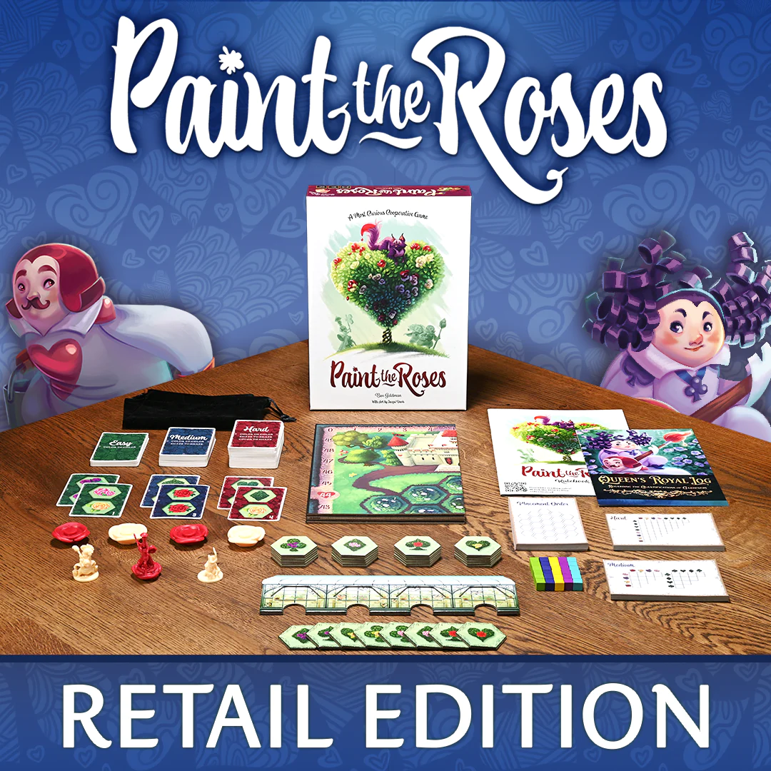 Paint the Roses Deluxe Edition with all components; illustrated characters visible in the corners.