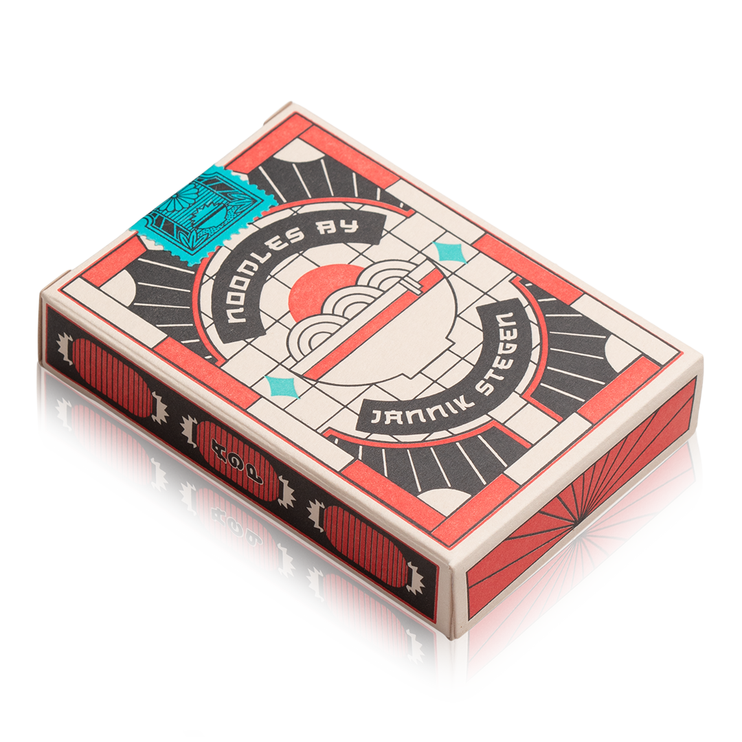 Ramen Heads playing cards in a red and black box with a ramen bowl graphic.