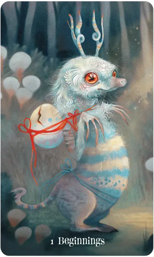 Wisdom of the Wild Things Oracle featuring an antlered creature holding an egg in a misty forest.