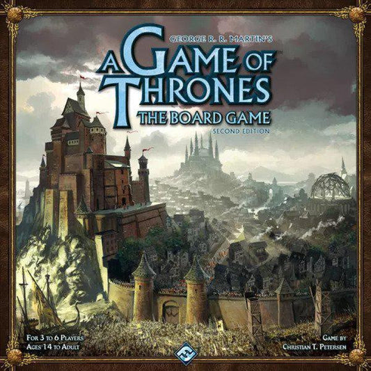 A Game of Thrones Boardgame Second Edition box featuring a fantasy castle and city with mountains on the cover art.