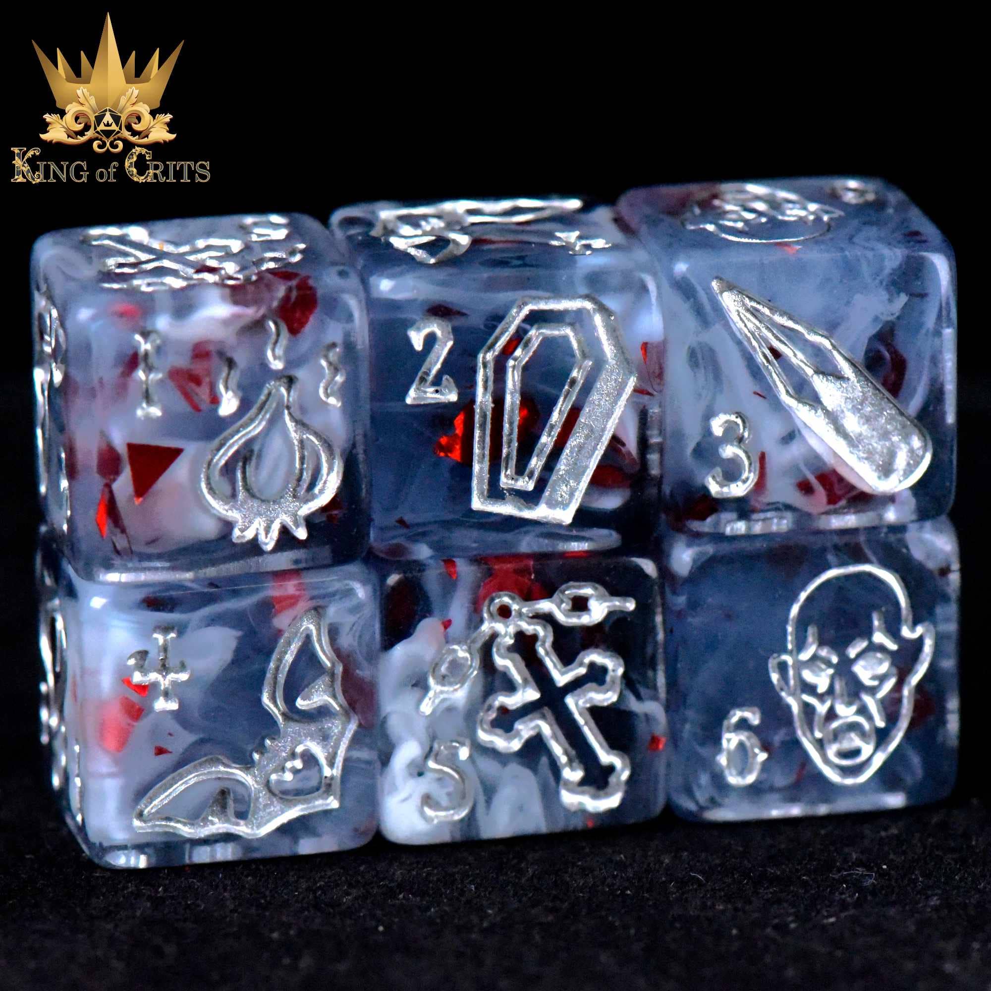 Vampiric Bloodline 11-piece dice set, translucent with red and white swirls, silver symbols and numbers.