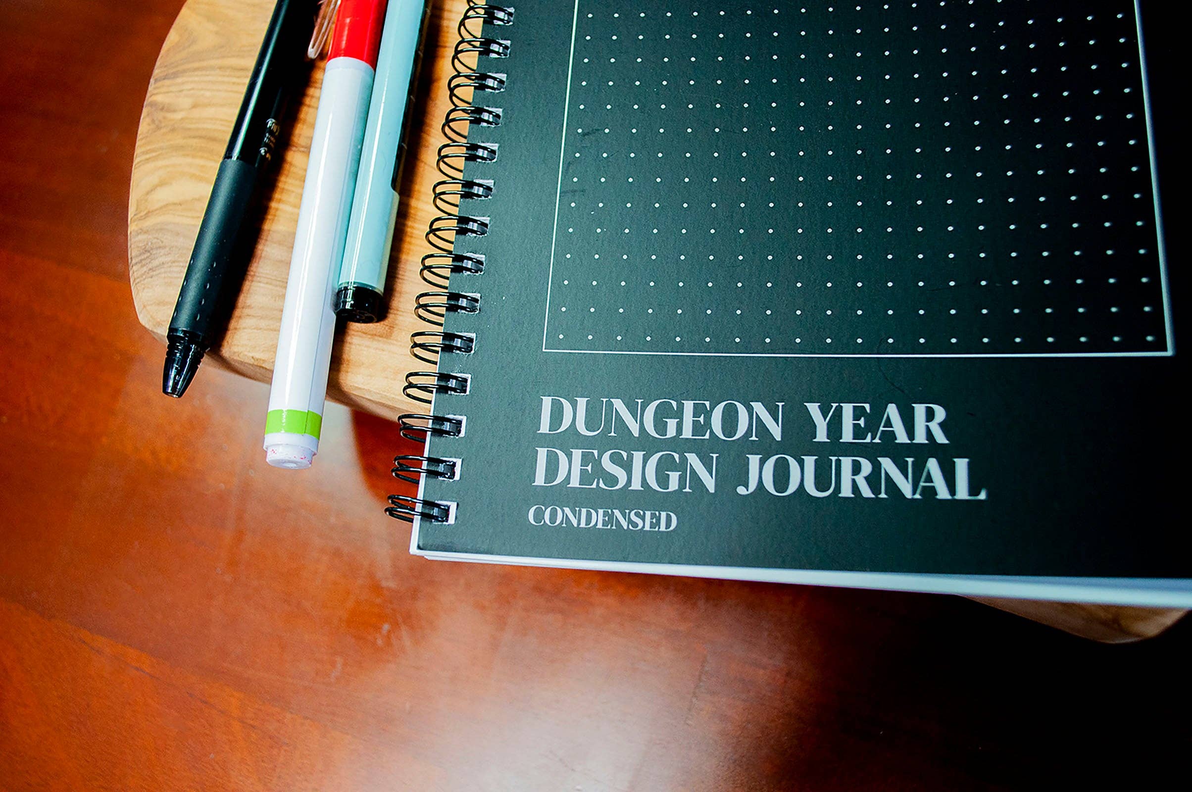 Dungeon Year Design Journal for solo RPGs and megadungeon journaling, with included pens.