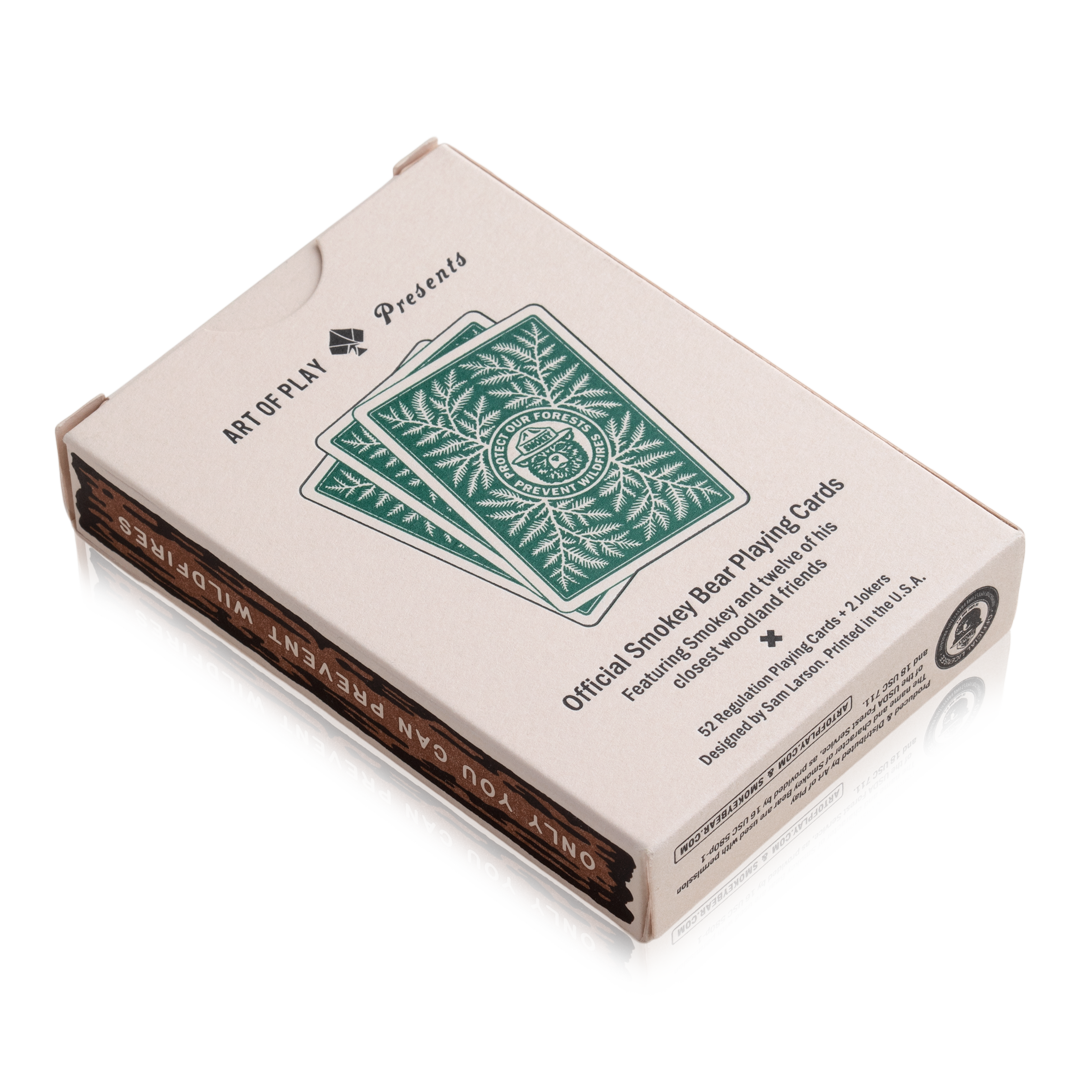 Smokey Bear playing cards in a box.
