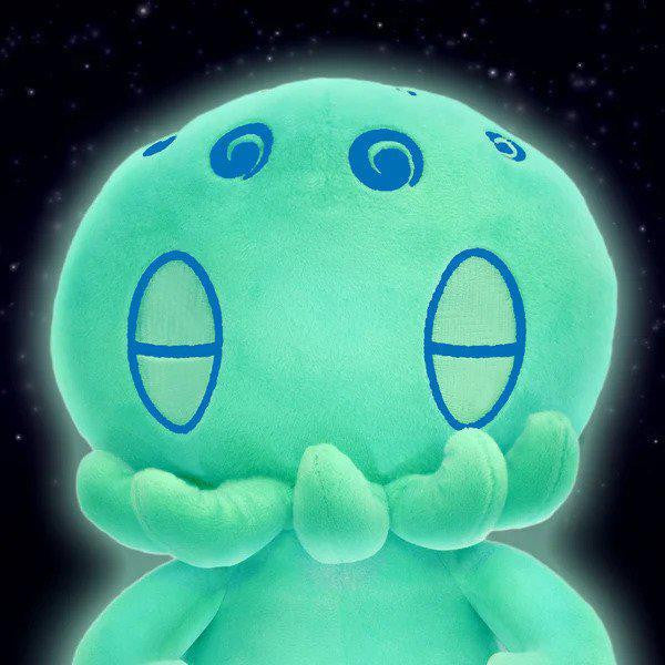 C is for Cthulhu GLOW-IN-THE-DARK Plush with teal fur, oval eyes, spiral marks, and tentacles.