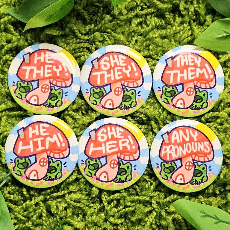 Set of six large, colorful laminated waterproof pronoun frog mushroom buttons.