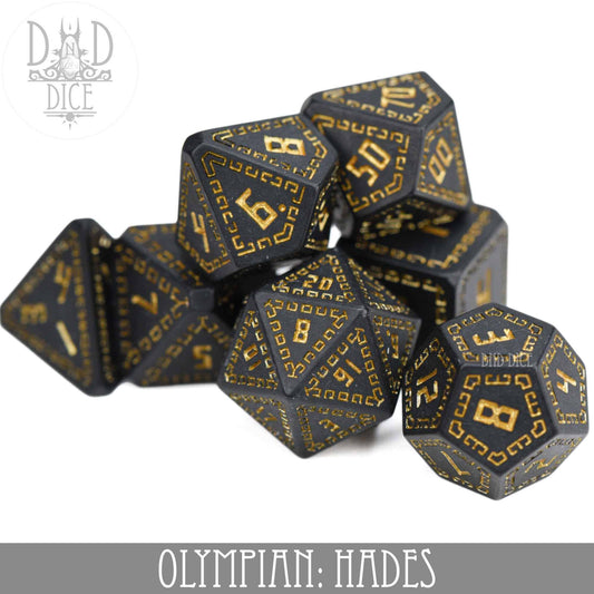 7-piece black resin dice set with gold numbering and patterns, Olympian: Hades variant.