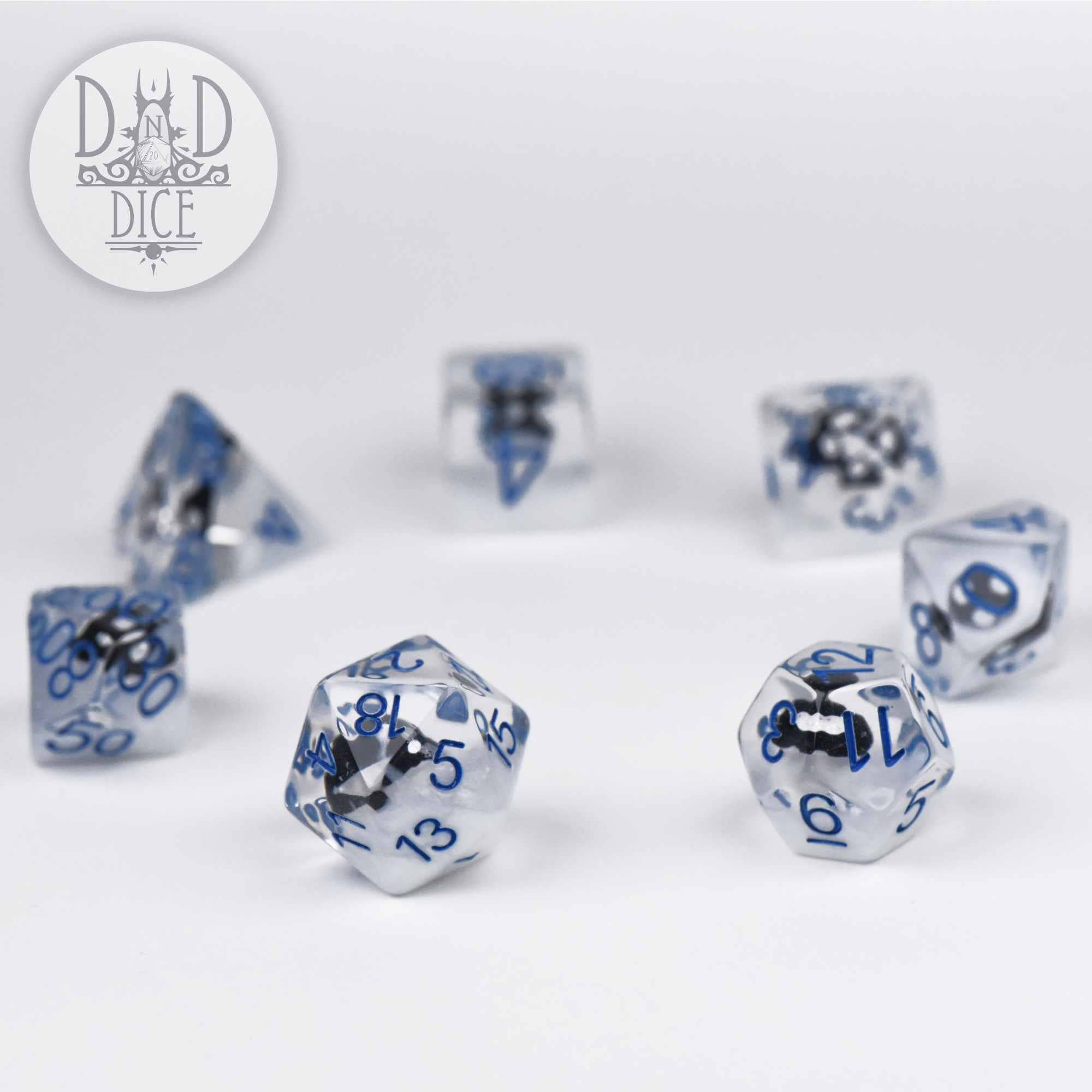 Fungal Freeze set of 7 clear resin dice with blue numbers for tabletop gaming; includes DnD Dice logo.