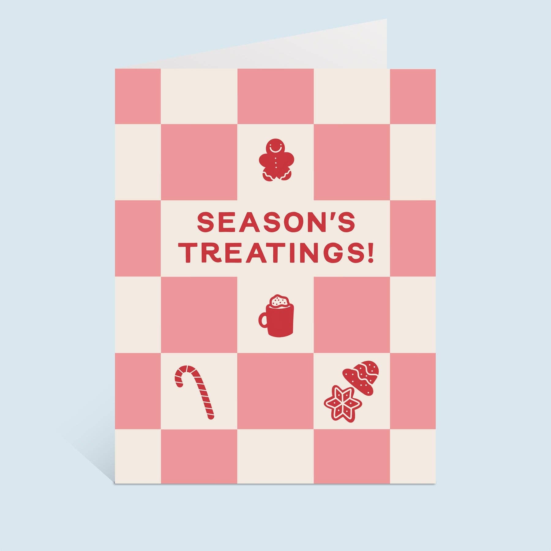 Season’s Treatings holiday greeting card with pink and cream checkerboard pattern, gingerbread, and cocoa icons.