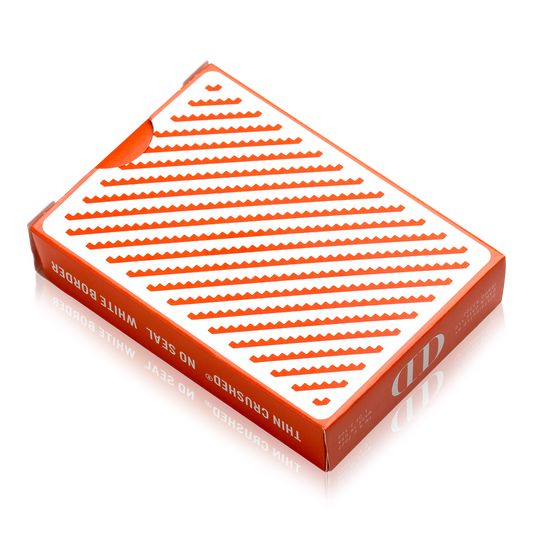 Damn Good Cards, No. 5 poker-size tuck box, orange and white diagonal zig-zag pattern, thin crushed stock.