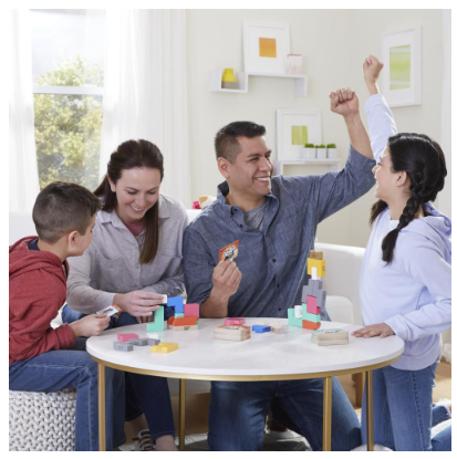 Jenga Maker - Jenga for Teams game with colorful blocks being played by four people around a table.