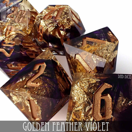 7-piece resin dice set with gold numbers, golden feathers, and vivid violet background. Golden Feather Violet Handmade.