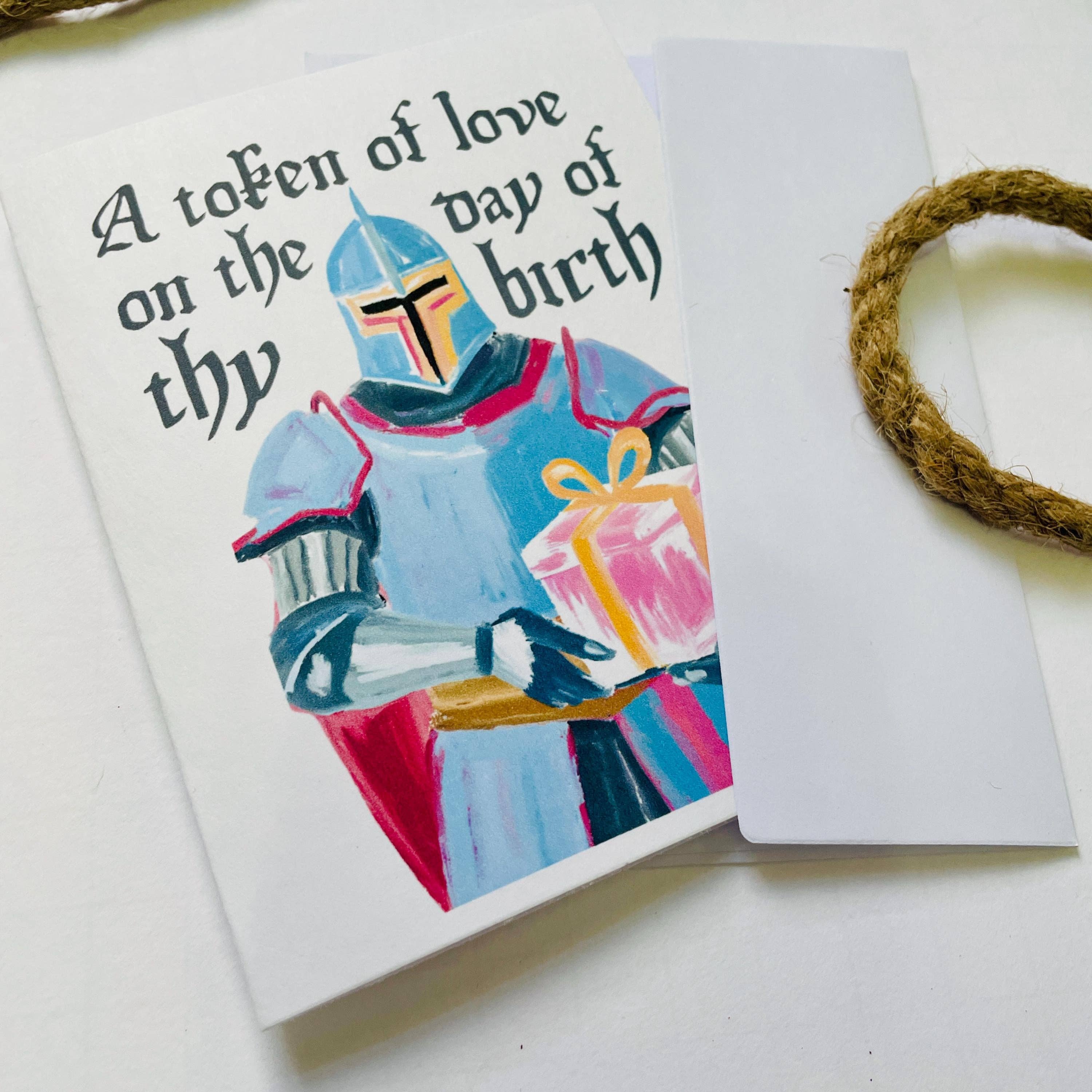 Birthday card featuring a knight and the text “A token of love on the day of thy birth.” Medieval & Renaissance theme.