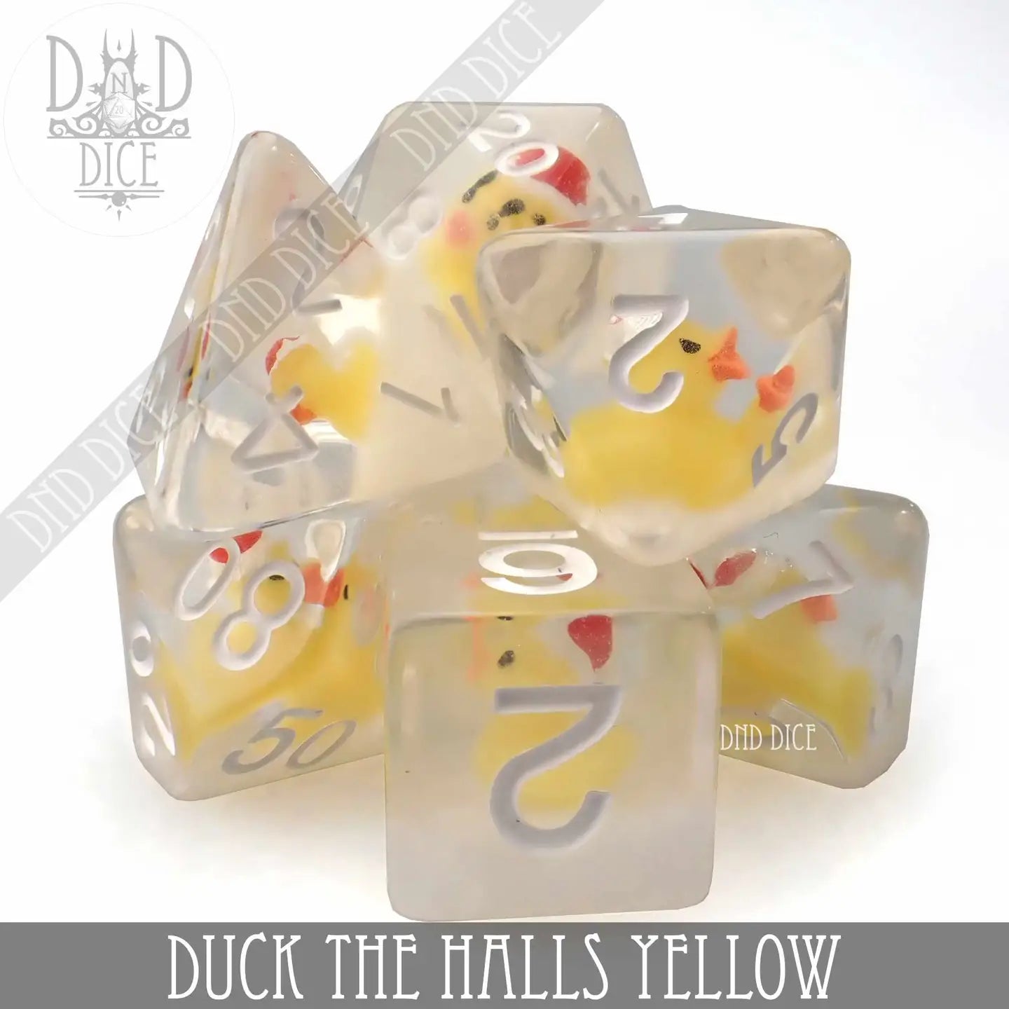 Duck the Halls Dice Set Yellow, 7 clear resin polyhedral dice with small yellow ducks inside.
