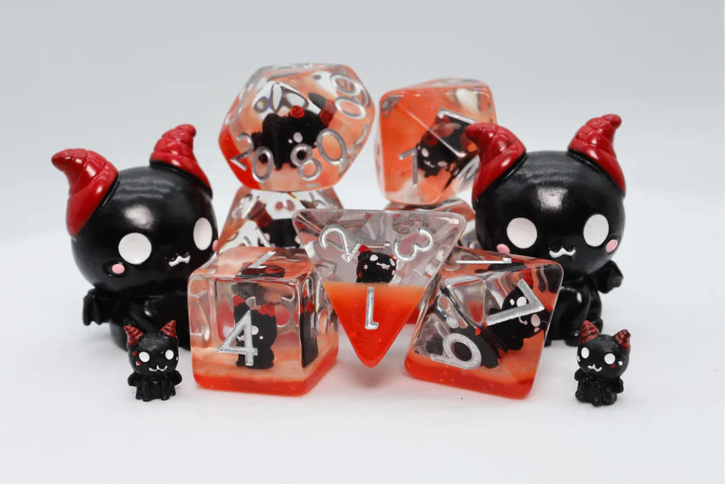 Baby Fiend RPG Dice Set with red and black dice, horned figurines, and small matching charms.