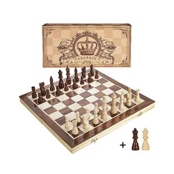 Magnetic wooden chess set with white and brown pieces in a crown-decorated storage box.