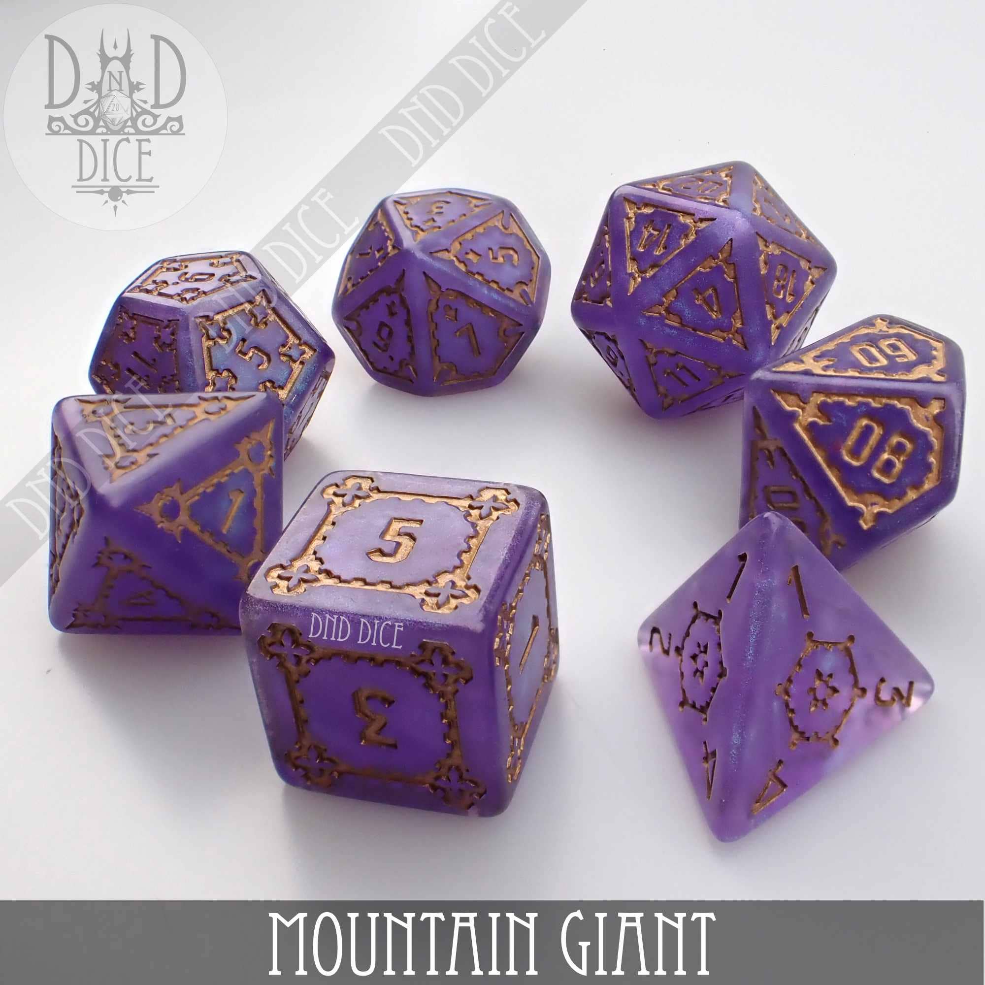 7-piece purple resin Mountain Giant (Oversize) dice set with gold numbers from DND Dice.