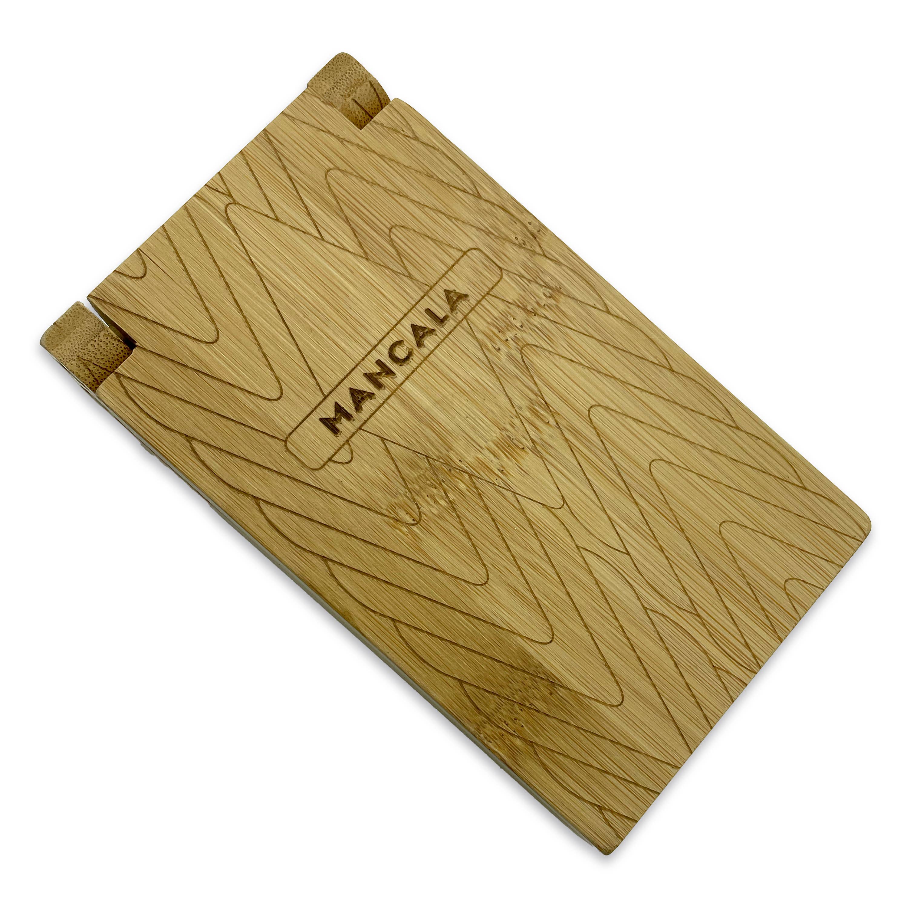 Travel Bamboo Mancala Game with closed board, geometric patterns, and magnetic clasp.