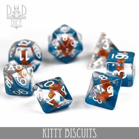7-piece blue resin DnD dice set with small orange cat figures inside, Kitty Biscuits variant.
