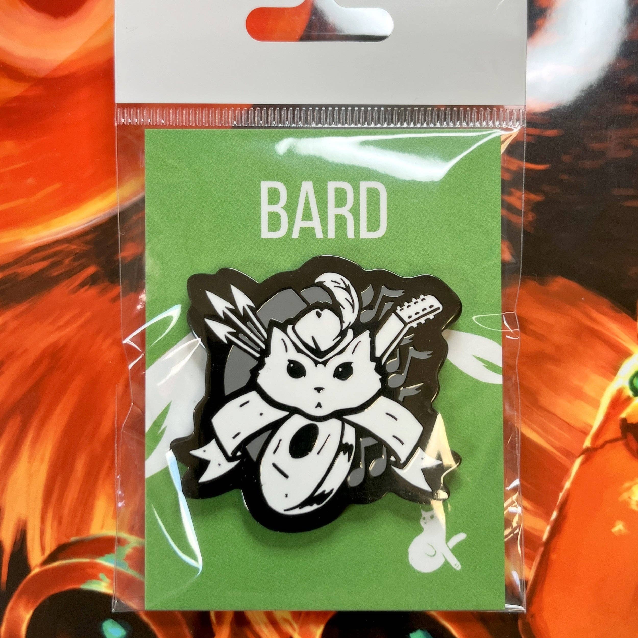 Hard enamel pin of a cat bard with arrows, lute, and scroll; butterfly clutch backing.