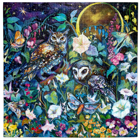 Moon Garden 1000 Piece Puzzle featuring two owls among flowers and butterflies under a starry sky.