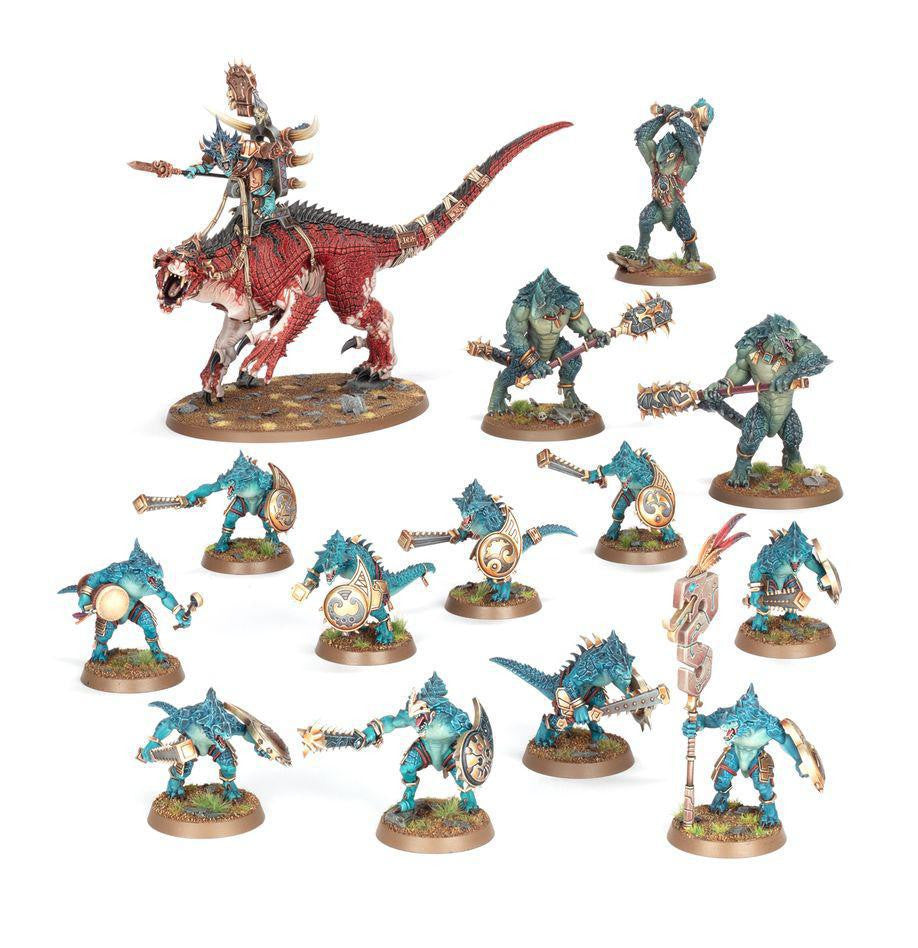Spearhead: Seraphon miniatures set with painted lizard warriors and a red Carnosaur with rider on round bases.