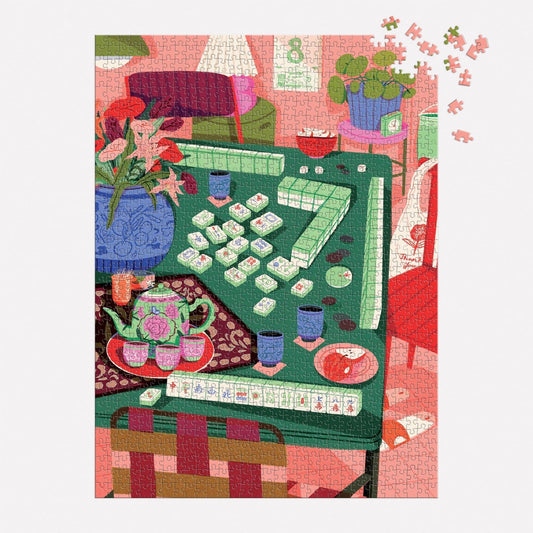 Mahjong Social 1000 Piece Puzzle by Paige Jung featuring flowers, tea, cups, and tiles on a green table.