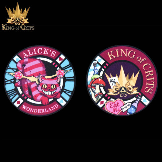 Two circular Alice’s Wonderland - 11 Dice Set (Sharp Edge) embroidered patches featuring the Cheshire Cat, crown, mushrooms.