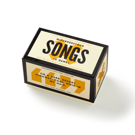 Misunderstood Songs Game box displaying misheard song lyrics on one side.