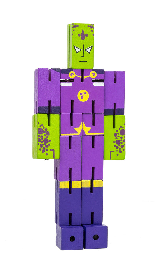 Green and purple wooden robot toy from Puzzle Planet Display with geometric and dot patterns.