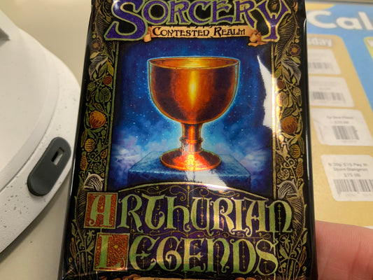 Arthurian Legends Booster Box [ART - 000] from Sorcery: Contested Realm with golden cup and mystical artwork on box.