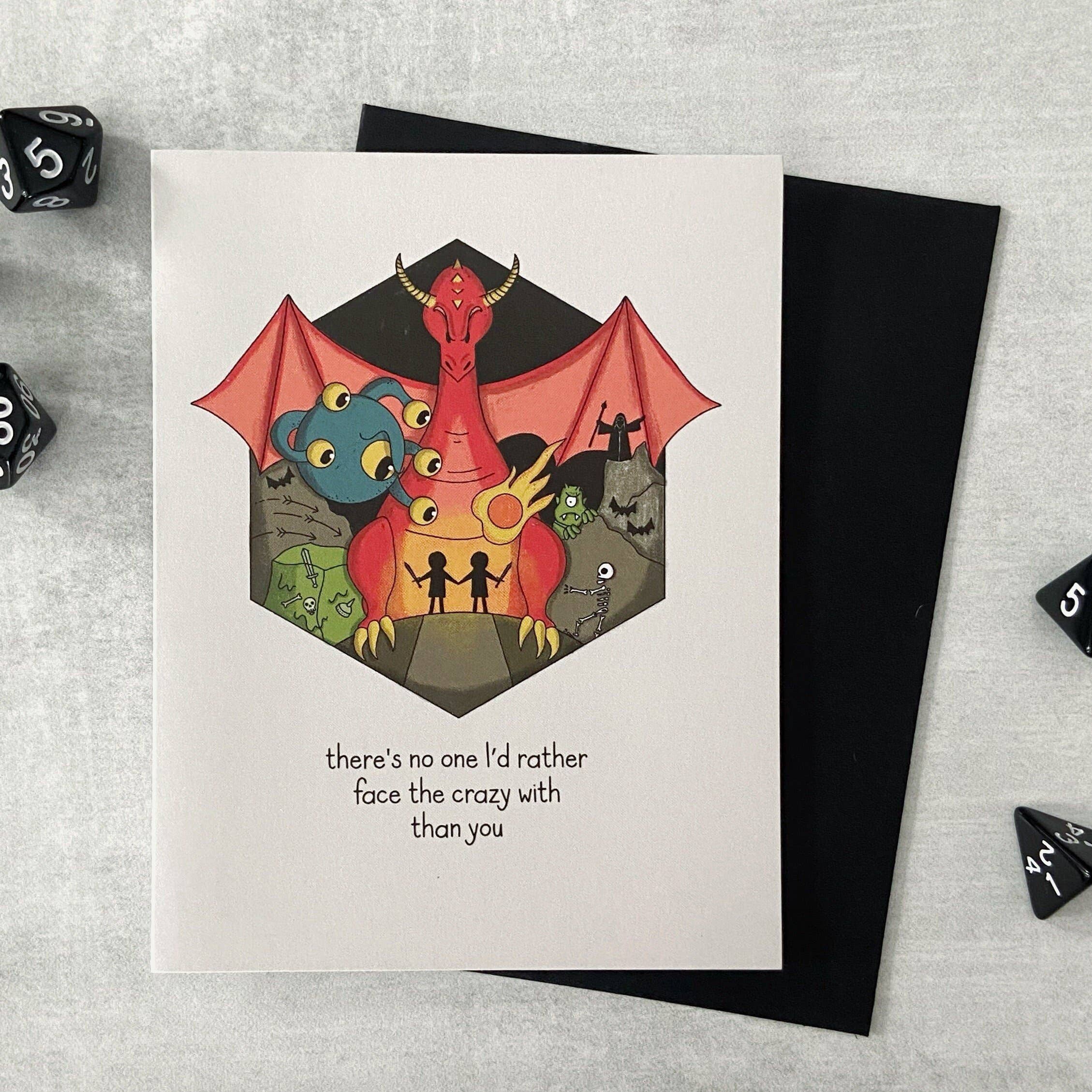 Face the Crazy Together card featuring D&D/RPG theme with red dragon, quirky characters, and friendship message.