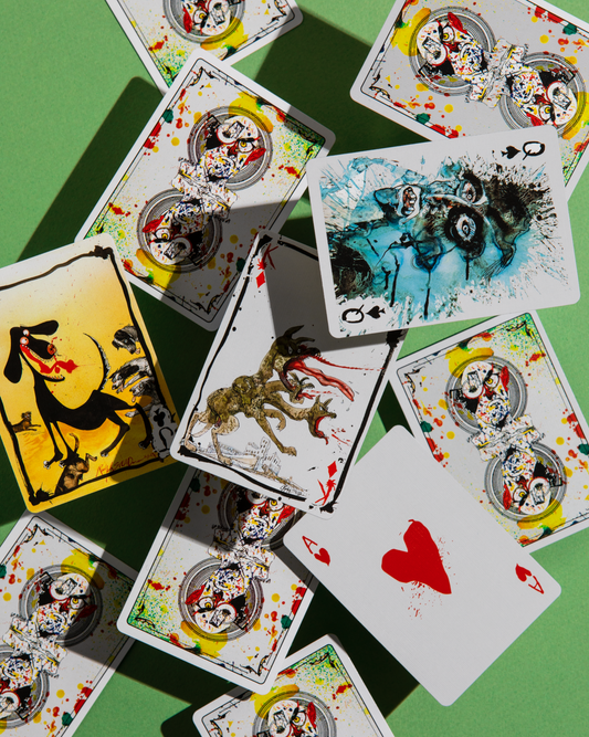 Flying Dog Edition 2 playing cards with abstract, colorful ink-splatter designs.