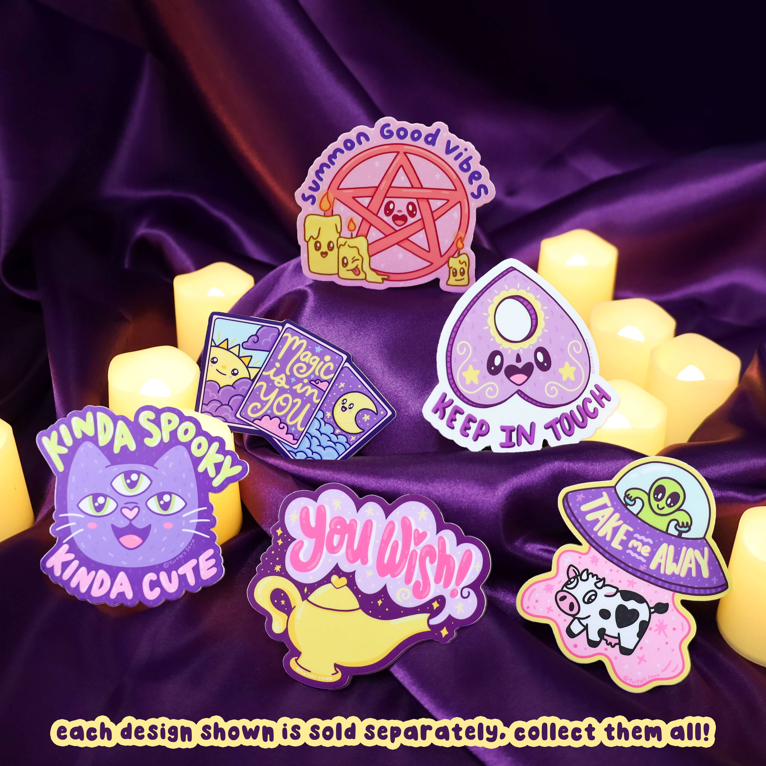 Summon Good Vibes Pentagram Kawaii Sticker displayed with pins and LED candles on purple satin fabric.