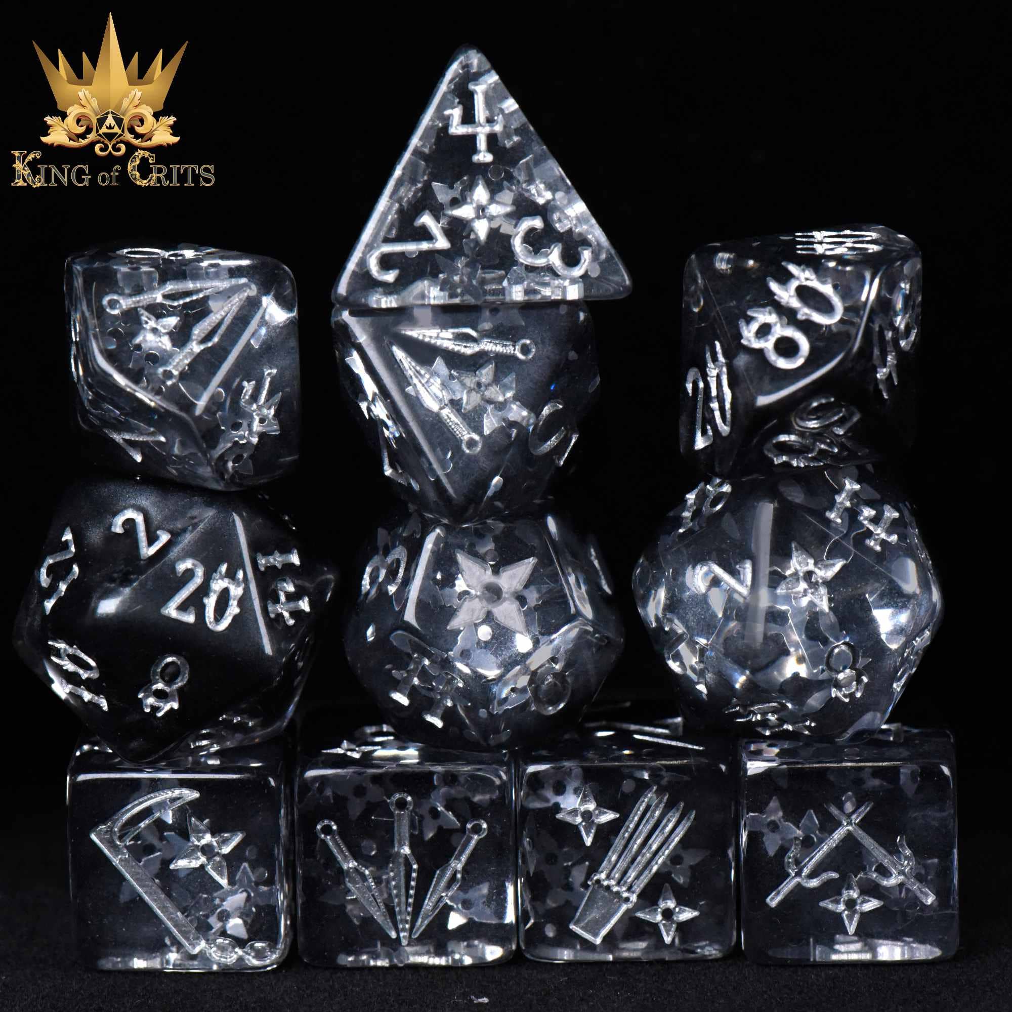 The Art of Stealth - 11 Dice Set with clear resin dice and white designs. King of Crits logo in background.