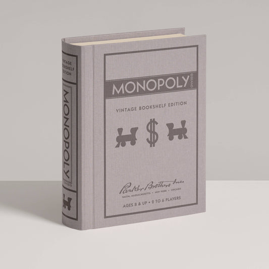 Monopoly Vintage Bookshelf Edition in a grey book-style box with included game components.
