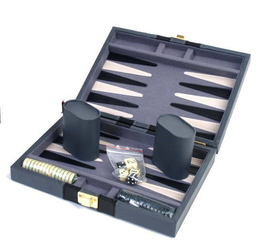 9 Mag Backgammon set with checkers, dice, doubling cube, and cups in a gray travel case.