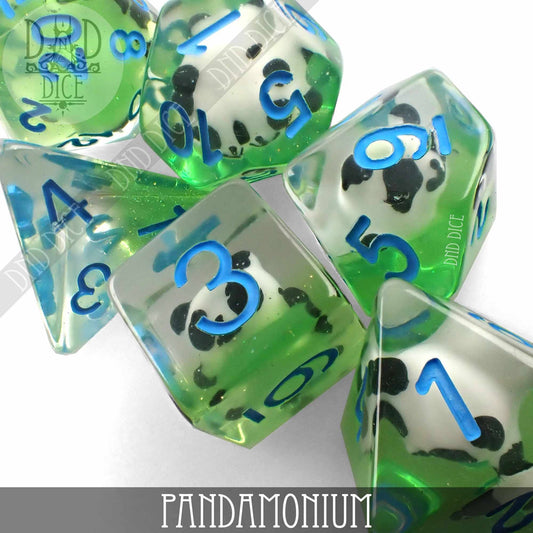 Green-clear resin polyhedral dice set with blue numbers and small panda figures embedded inside.