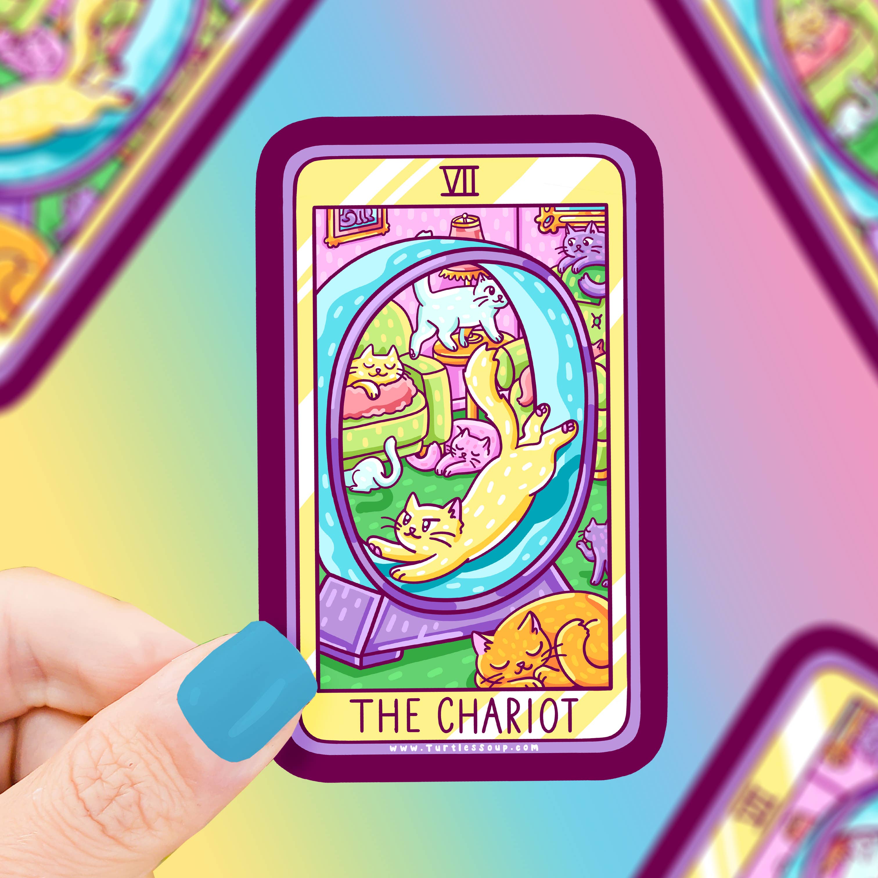 The Chariot Cat Major Arcana Tarot Card Vinyl Sticker featuring cats, held in a hand.