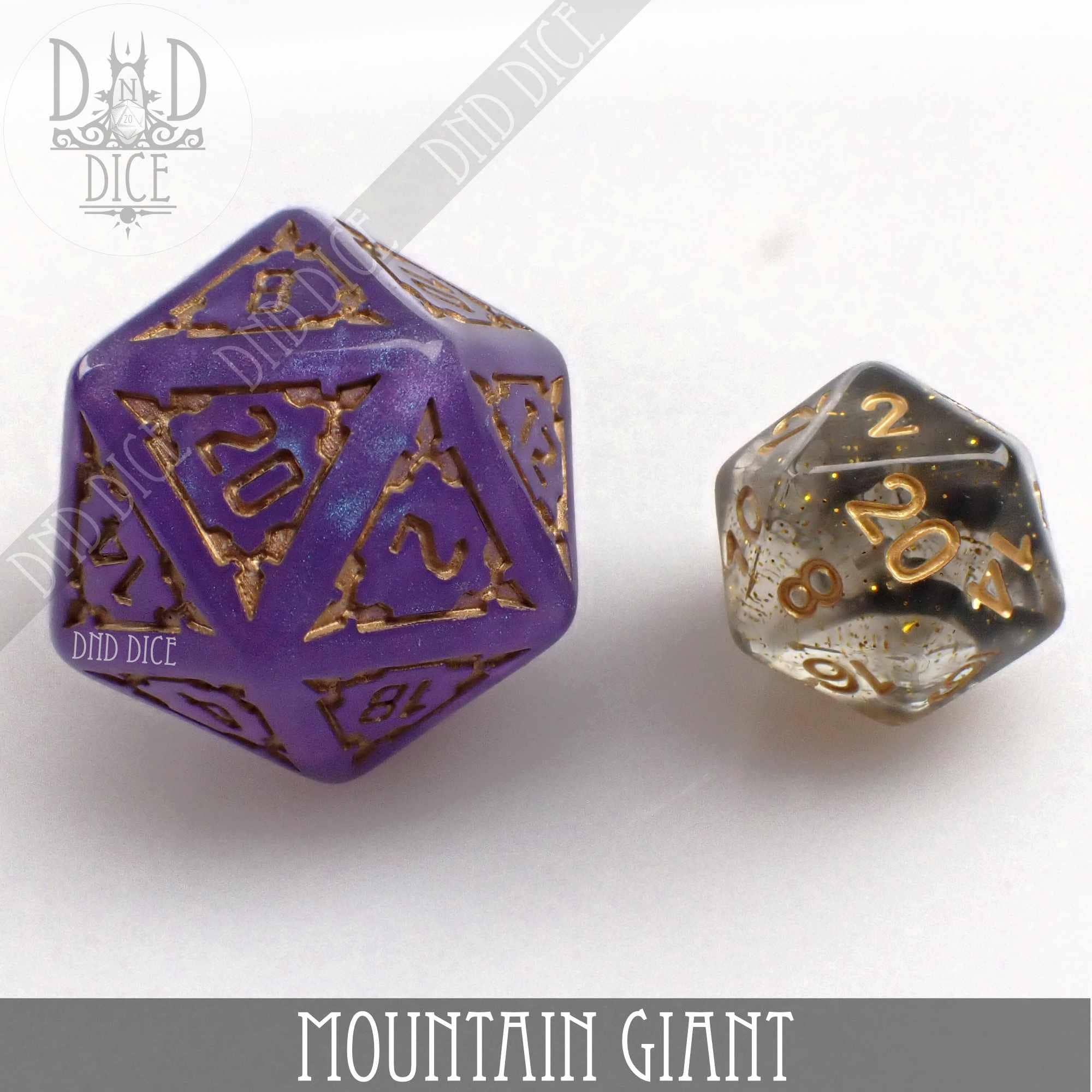Large purple Mountain Giant (Oversize) D20 and smaller black-gold D20 from resin 7-dice set.