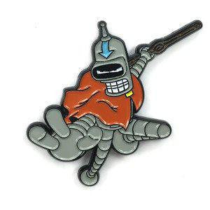 Kolorspun Pins Air Bender enamel pin featuring a cartoon robot with blue arrow, red cape, black metal, and rubber back.