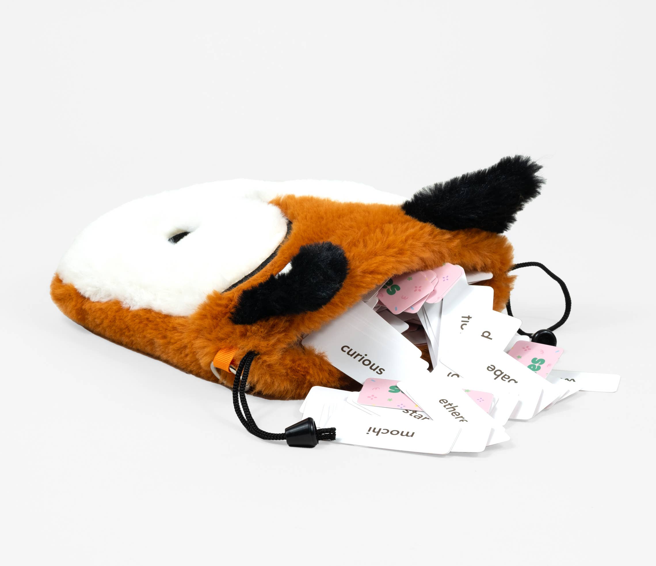 The Pet Names: A Game of Endearments fox plush bag with word cards for party or pet name games.