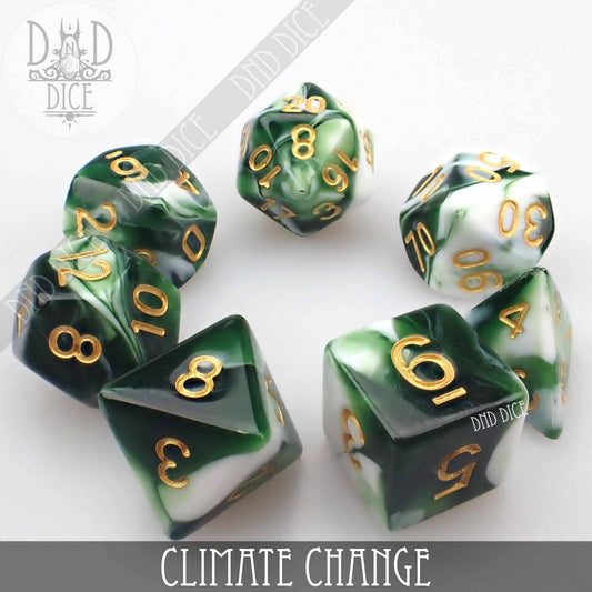 Green and white marbled acrylic dice with gold numbers arranged in a circle. Text: Climate Change 7 or 11.