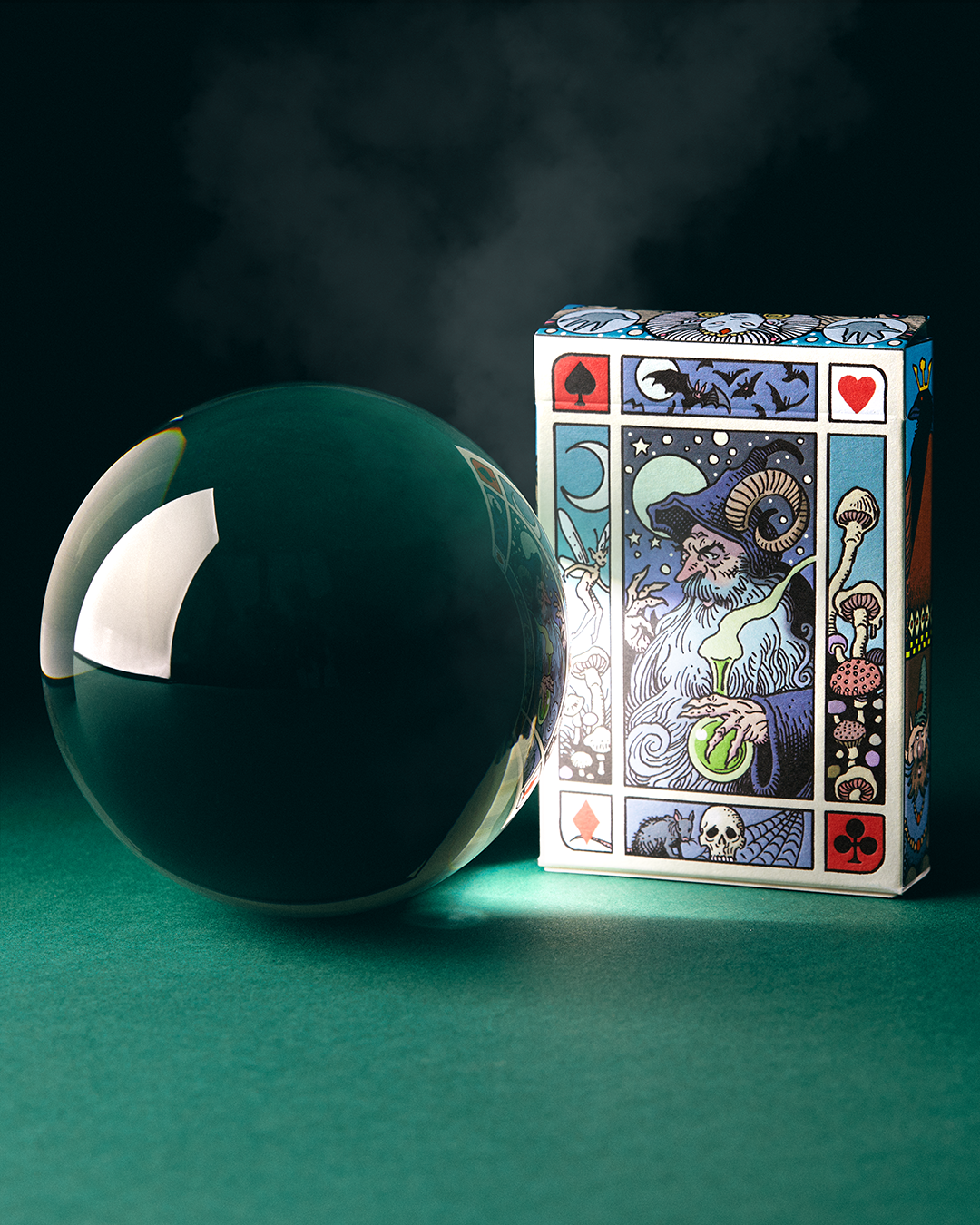 Fantasy Playing Cards transformation deck card with a wizard and crystal ball illustration.