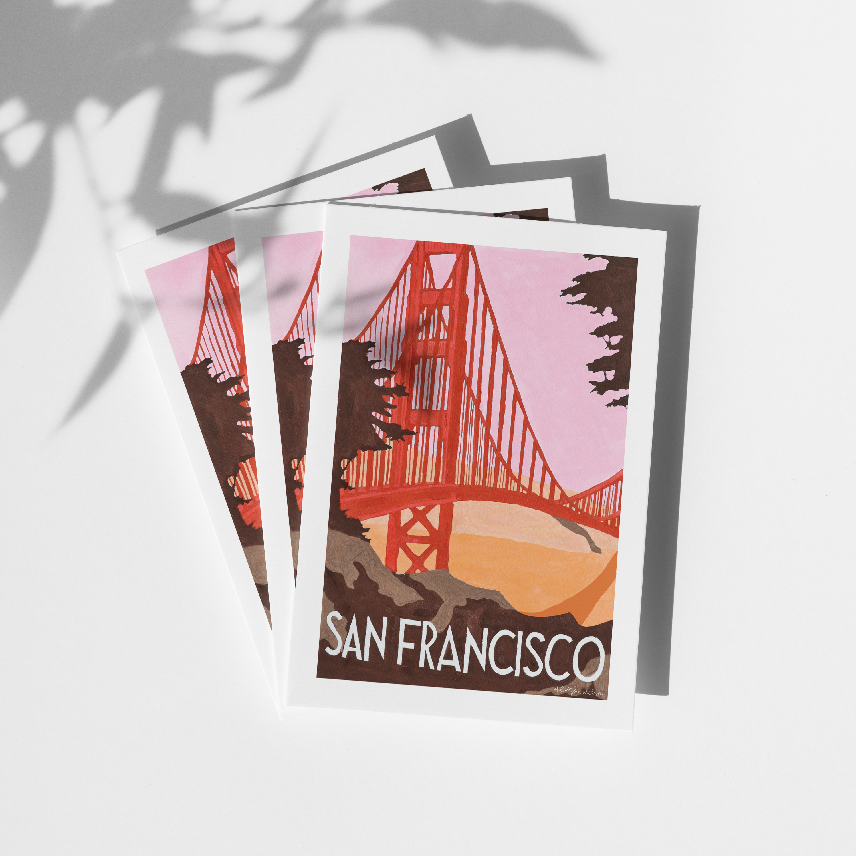 Golden Gate Travel Poster Greeting Card (Blank) with San Francisco text on white surface with leaf shadows.
