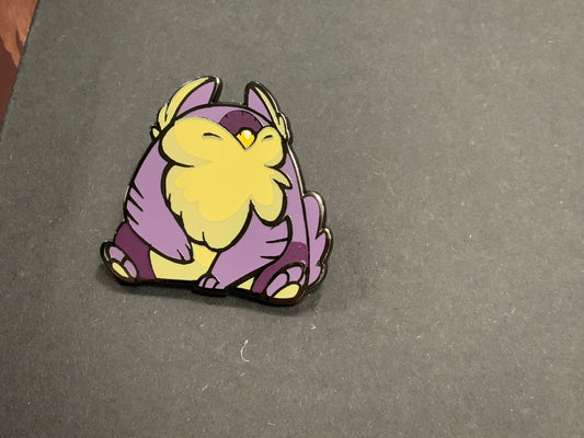 Heliana monster hunting pin featuring Tarling/Owlbear on a dark gray surface.