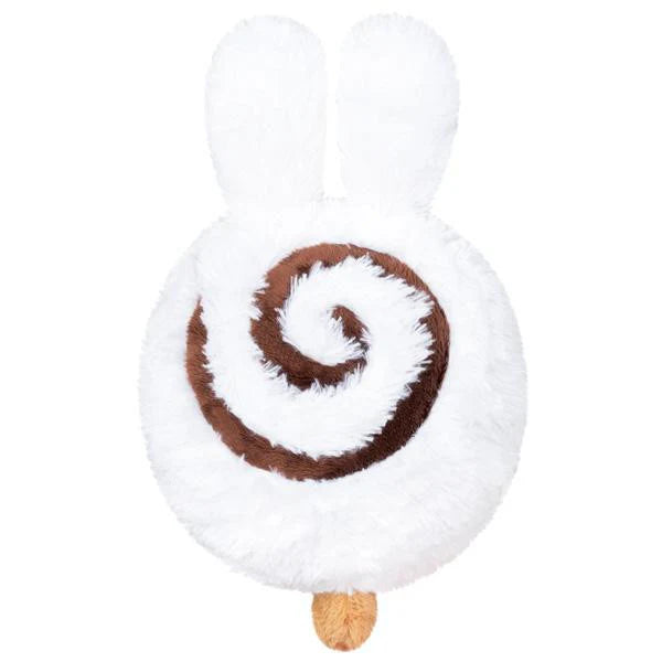 Mini Squishable Cinnabunny plush shaped like a white cinnamon roll with bunny ears and a brown tail.